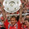 FILE PHOTO: Andreas Brehme of Kaiserslautern holds up the trophy of Germany's first league soccer championship i..