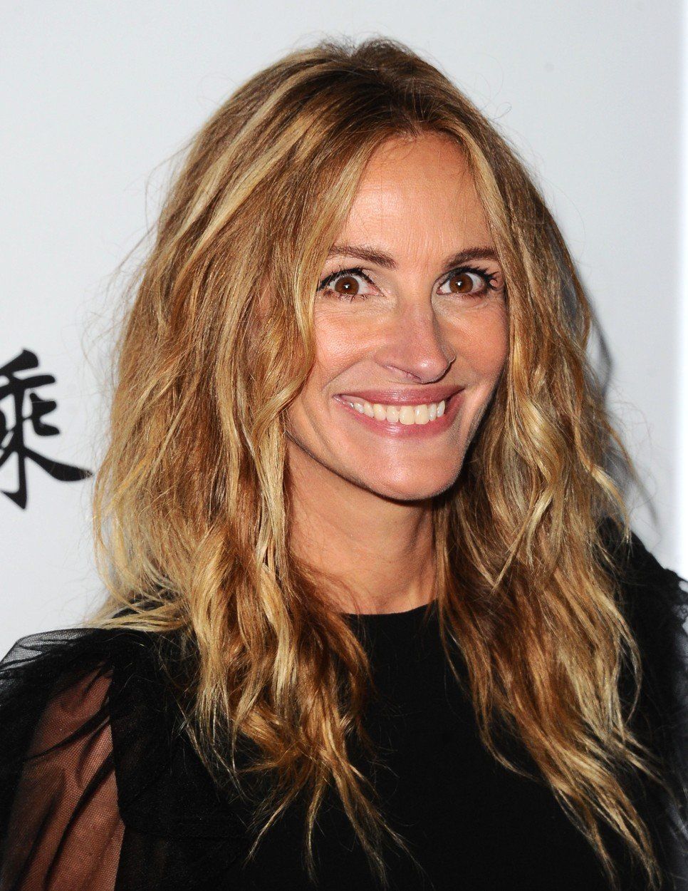 hollywoodsky usmev, zena