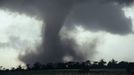 Close Tornado drops from a wall cloud during a tornado outbreak in Nebraska USA May 2004