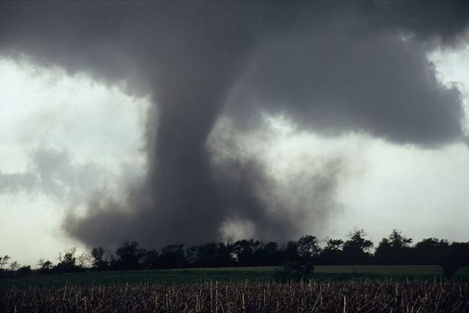 Close Tornado drops from a wall cloud during a tornado outbreak in Nebraska USA May 2004