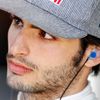 Toro Rosso Formula One driver Carlos Sainz of Spain looks on during the second practice session of the Australian F1 Grand Prix at the Albert Park circuit in Melbourne