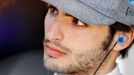 Toro Rosso Formula One driver Carlos Sainz of Spain looks on during the second practice session of the Australian F1 Grand Prix at the Albert Park circuit in Melbourne Ma