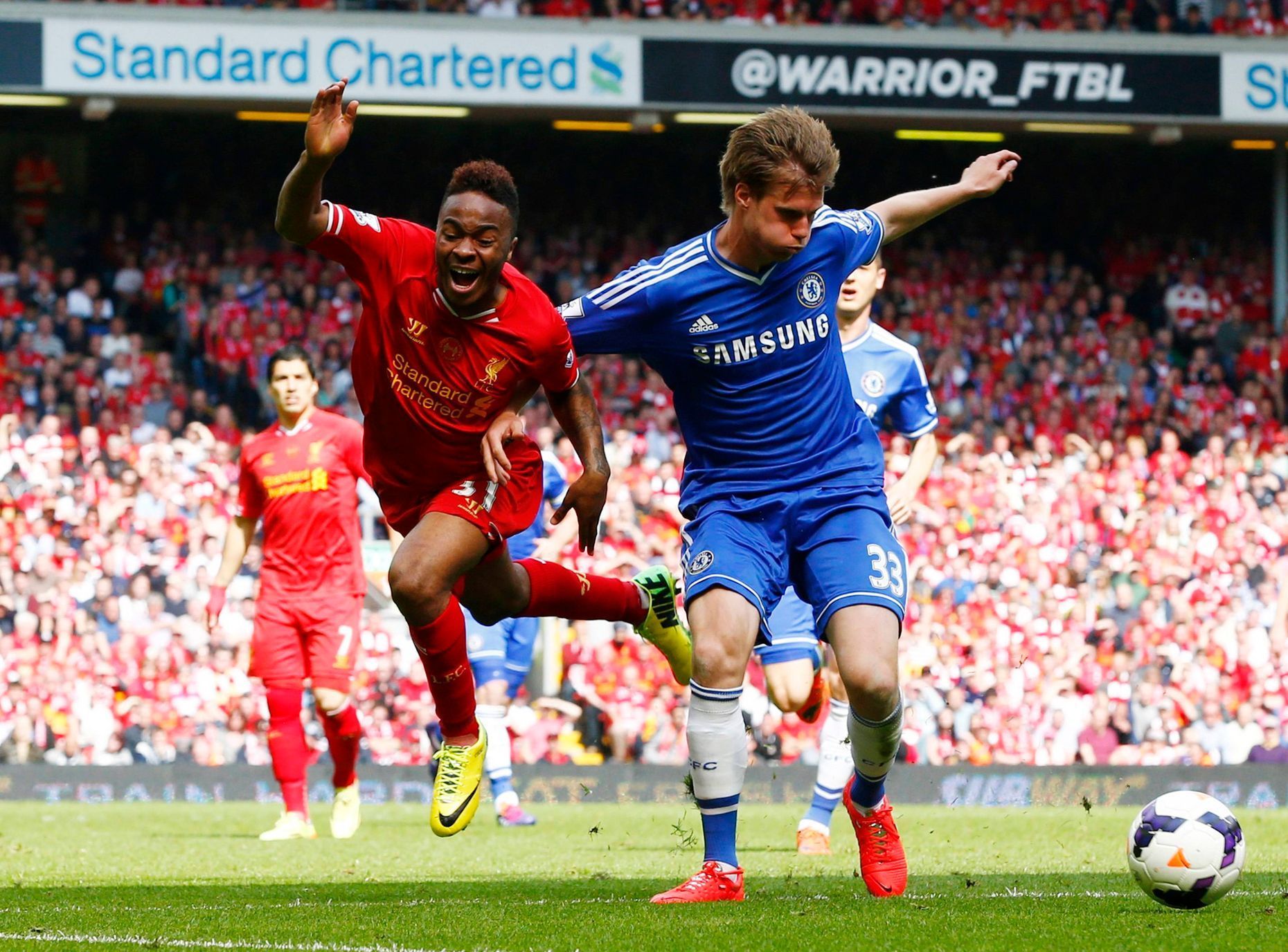 Chelsea's Kalas challenges Liverpool's Sterling during their English Premier League soccer match at Anfield in Liverpool