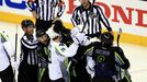 Jan 25, 2015; Columbus, OH, USA; Members of Team Toews and Team Foligno are separated by linesman Tony Sericolo (84) after a whistle in the second period in the 2015 NHL