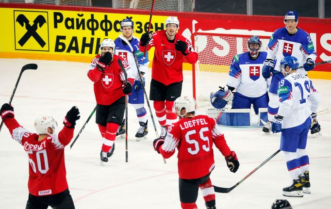 Romain Loeffel slaví branku do sítě Slovenska