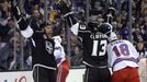 Jun 4, 2014; Los Angeles, CA, USA; Los Angeles Kings left wing Kyle Clifford (13) celebrates with center Jeff Carter (left) after scoring a goal against the New York Rang