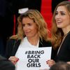 Actress Julie Gayet and director Lisa Azuelos hold a placard which reads &quot;Bring back our girls&quot; as they pose on the red carpet at the 67th Cannes Film Festival in Cannes