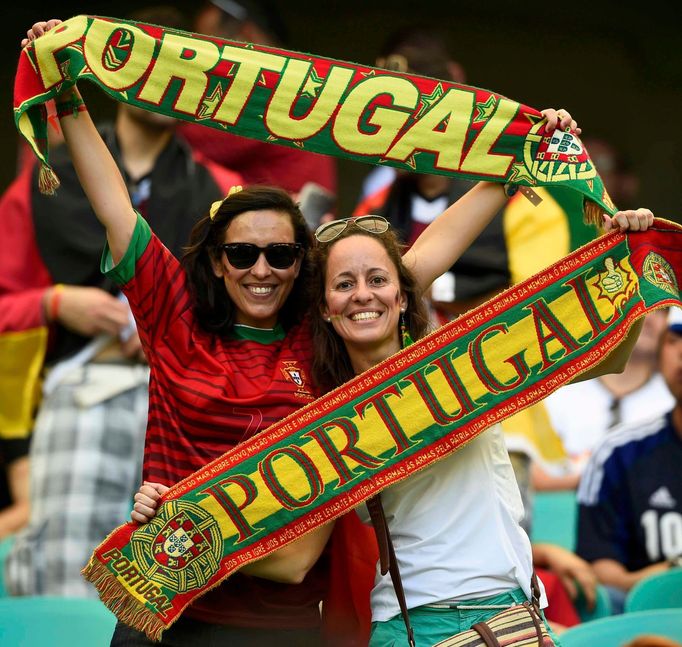 Fans of Portugal pose for a photo before the 2014 World Cup Group G soccer match between Germany and Portugal at the Fonte Nova arena in Salvador, June 16, 2014. REUTERS/