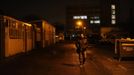 George Kapetanios walks to his flat in Potters Bar as he makes his way home from the Ta Dilina Greek restaurant in north London where he works as a chef