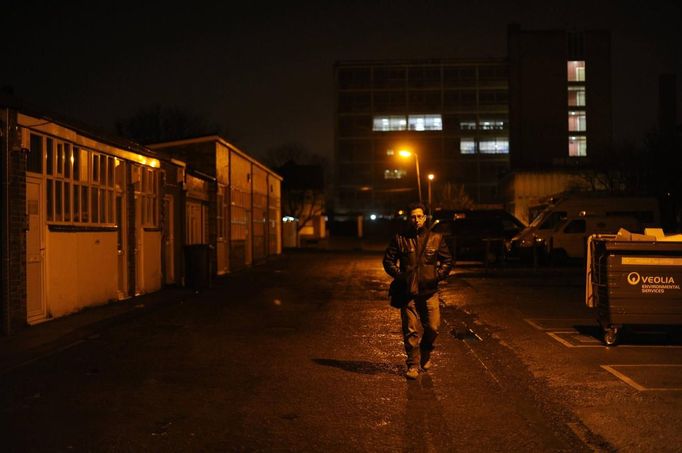 George Kapetanios walks to his flat in Potters Bar as he makes his way home from the Ta Dilina Greek restaurant in north London where he works as a chef