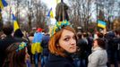 A woman wearing a national flower crown looks back as she attends a pro-Ukrainian rally in Luhansk, eastern Ukraine April 15, 2014.