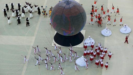 Performers take part in the 2014 World Cup opening ceremony at the Corinthians arena in Sao Paulo June 12, 2014. REUTERS/Fabrizio Bensch (BRAZIL - Tags: SOCCER SPORT WORL