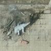 A satellite image shows destroyed TU 95 aircrafts in the aftermath of a drone strike at the Olenya air base
