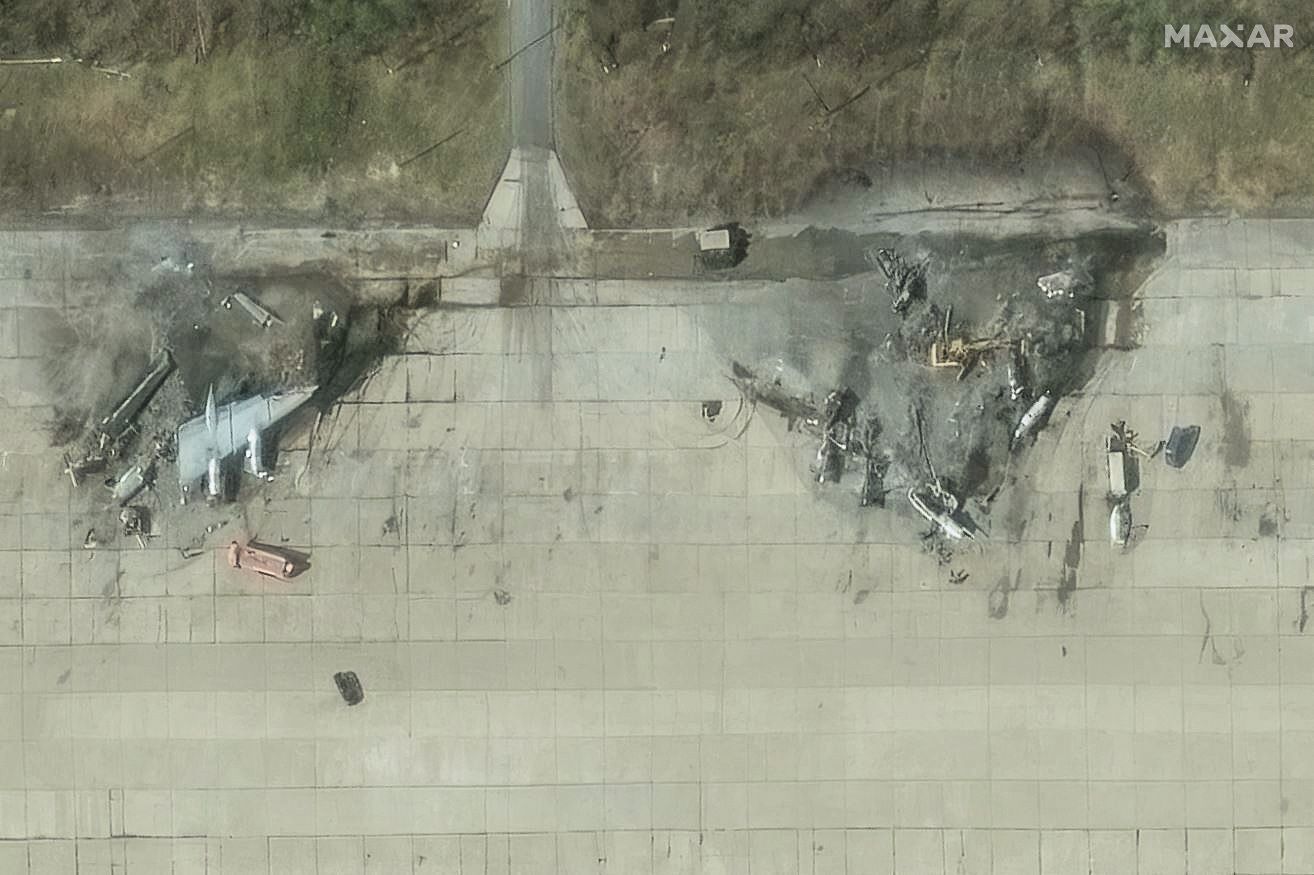 A satellite image shows destroyed TU 95 aircrafts in the aftermath of a drone strike at the Olenya air base