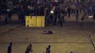 A man falls during clashes between anti-Mursi protesters, and members of the Muslim Brotherhood and ousted Egyptian President Mohamed Mursi supporters, along a road at Ramsis square, which leads to Tahrir Square, at a celebration marking Egypt's 1973 war with Israel, in Cairo October 6, 2013. At least 28 people were killed and more than 90 wounded in clashes during protests in Egypt on Sunday, security sources and state media said, as the crisis since the army seized power three months ago showed no sign of abating.