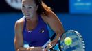 Jelena Jankovic of Serbia hits a return to Misaki Doi of Japan during their women's singles match at the Australian Open 2014 tennis tournament in Melbourne January 14, 2