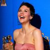 Maggie Gyllenhaal poses with her award during the 72nd Golden Globe Awards in Beverly Hills