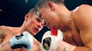 World champion Gennadiy Golovkin of Kazakhstan (R) punches Martin Murray of England during the WBA-WBC-IBO Middleweight World Championship in Monte Carlo, early February