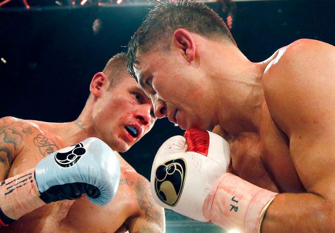 World champion Gennadiy Golovkin of Kazakhstan (R) punches Martin Murray of England during the WBA-WBC-IBO Middleweight World Championship in Monte Carlo, early February