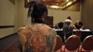 Evelyne Greenwald, from Belgium, awaits her turn to be judged during the National Tattoo Association Convention in Cincinnati, Ohio April 13, 2012. Greenwald has traveled four times in the past year to Ukraine where tattoo artist Dmitriy Samohin has completed tattoos of a horse, bird, wild cats and American Indians. She claims she is addicted to the art because it is so beautiful. Picture taken April 13, 2012. REUTERS/Larry Downing (UNITED STATES - Tags: SOCIETY) ATTENTION EDITORS PICTURE 31 OF 31 FOR PACKAGE 'ADDICTED TO THE NEEDLE' TO FIND ALL PICTURES SEARCH 'ADDICTED NEEDLE' Published: Čer. 29, 2012, 1 odp.