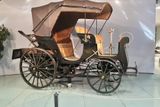 Historie kopřivnické automobilky se začala psát v roce 1897, kdy vznikl automobil NW Präsident. Ten byl prvním v celém Rakousku-Uhersku a o mnoho let předběhl Laurin & Klement. V muzeu je však k vidění jen replika ze 70. let, originál je v Národním technickém muzeu v Praze.