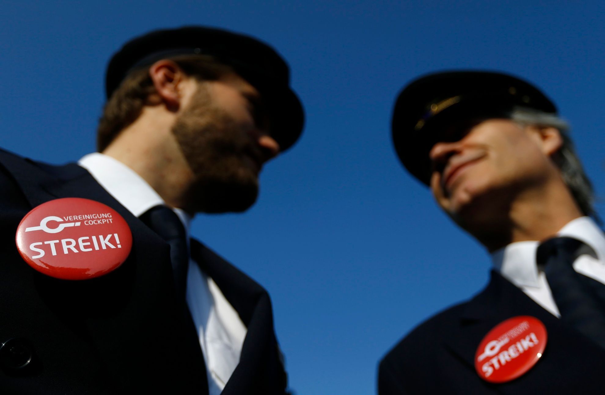 Lufthansa pilots wear badges reading &quot;strike&quot; on uniforms during demonstration at Fraport airport in Frankfurt