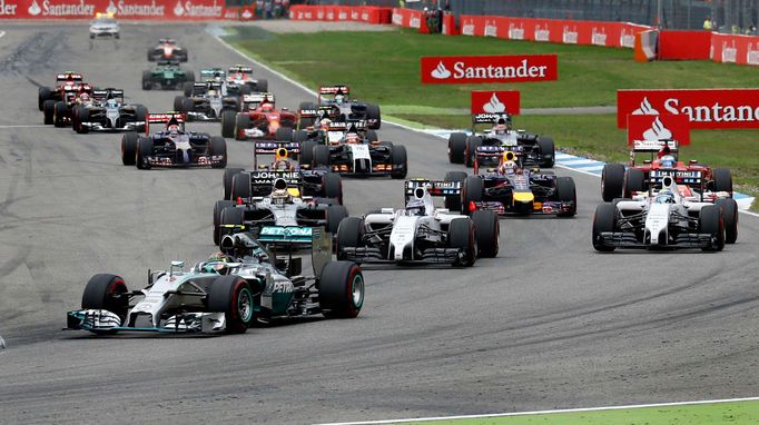 Mercedes Formula One driver Nico Rosberg leads the race in the first corner after the start of the German F1 Grand Prix at the Hockenheim racing circuit, July 20, 2014. R