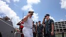 April 25, 2011 - Fort Lauderdale, Florida, U.S. - -- Fort Lauderdale, Fla. -- Commander John Gearhart salutes as he disembarks the USS Annapolis (SSN 760), a S6G nuclear reactor powered fast attack submarine, at Port Everglades in Fort Lauderdale on Monday. The USS Annapolis measures 362 ft. in length and 33 ft. at the beam, a diving depth of over 400 ft., 27+ mph, 12 vertical launch missile tubes, 4 torpedo tubes, and a crew of 130 enlisted submariners. The submarine was commissioned April 11, 1992 with its homeport in Groton, Connecticut. USS Annapolis sailed to the 21st Anniversary of Fleet Week at Port Everglades, Fort Lauderdale. (Credit Image: © Gary Coronado/The Palm Beach Post