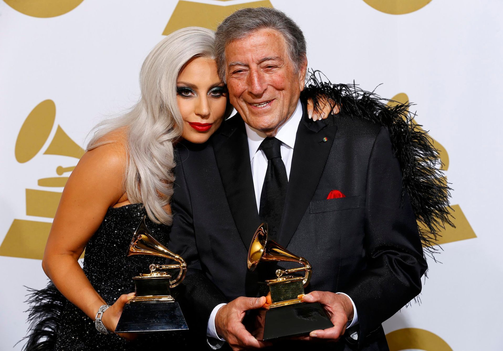 Lady Gaga and Tony Bennett pose with their awards during the 57th annual Grammy Awards in Los Angeles