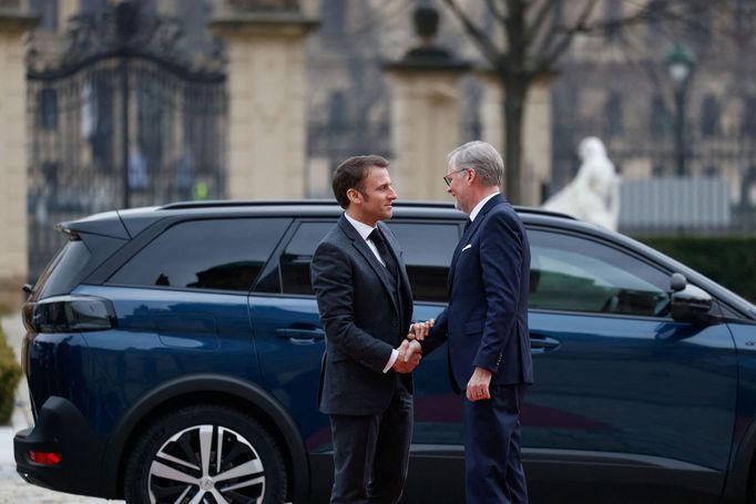 Czech Republic's Prime Minister Petr Fiala welcomes French President Emmanuel Macron at the government headquarters in Prague, Czech Republic, March 5, 2024. REUTERS/Davi