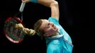 Petra Kvitova of the Czech Republic serves against Agnieszka Radwanska of Poland during their WTA Finals singles tennis match at the Singapore Indoor Stadium October 22,