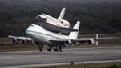 The space shuttle Discovery, attached to a modified NASA 747 aircraft, takes off headed for it's final home at The Smithsonian National Air and Space Museum from Cape Canaveral