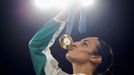 Paris 2024 Olympics - Boxing - Women's 66kg - Victory Ceremony - Roland-Garros Stadium, Paris, France - August 09, 2024. Gold medallist Imane Khelif of Algeria kisses her