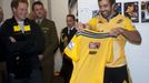 Hurricanes rugby captain Smith presents Britain's Prince Harry with a personalised jersey in Wellington