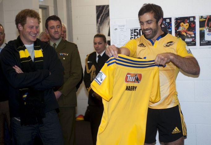 Hurricanes rugby captain Smith presents Britain's Prince Harry with a personalised jersey in Wellington