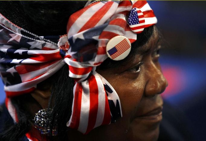 A delegate listens to an address during the first day of the Democratic National Convention in Charlotte, North Carolina, September 4, 2012. REUTERS/Jessica Rinaldi (UNITED STATES - Tags: POLITICS ELECTIONS) Published: Zář. 4, 2012, 11 odp.