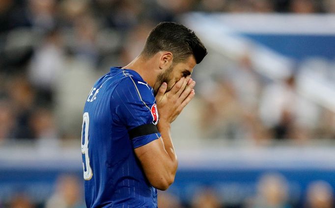 Italy's Graziano Pelle reacts after missing in the penalty shootout