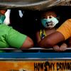 Fotogalerie / Lidé s maskami proti koronaviru / Reuters