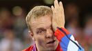 FILE PHOTO: Britain's gold medallist Chris Hoy cries on the podium during the victory ceremony for the track cycling men's keirin event at the Velodrome during the London