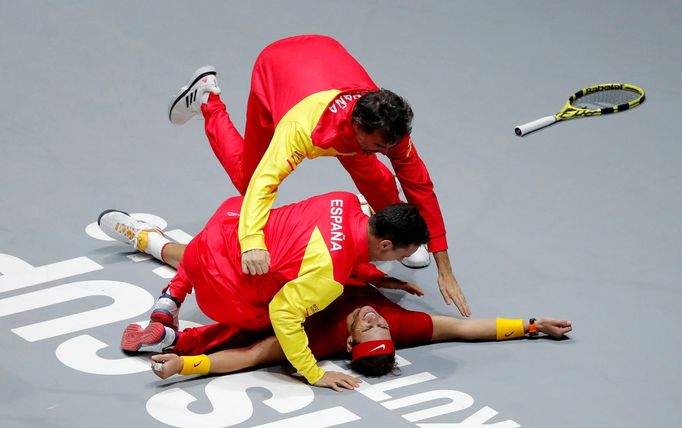 Tennis - Davis Cup Finals - Final - Caja Magica, Madrid, Spain - November 24, 2019   Spain's Rafael Nadal celebrates with the team after winning his match against Canada'