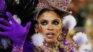 A reveller from the Uniao da Ilha samba school participates