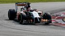 Force India Formula One driver Nico Hulkenberg of Germany takes a corner during the Malaysian F1 Grand Prix at Sepang International Circuit outside Kuala Lumpur, March 30