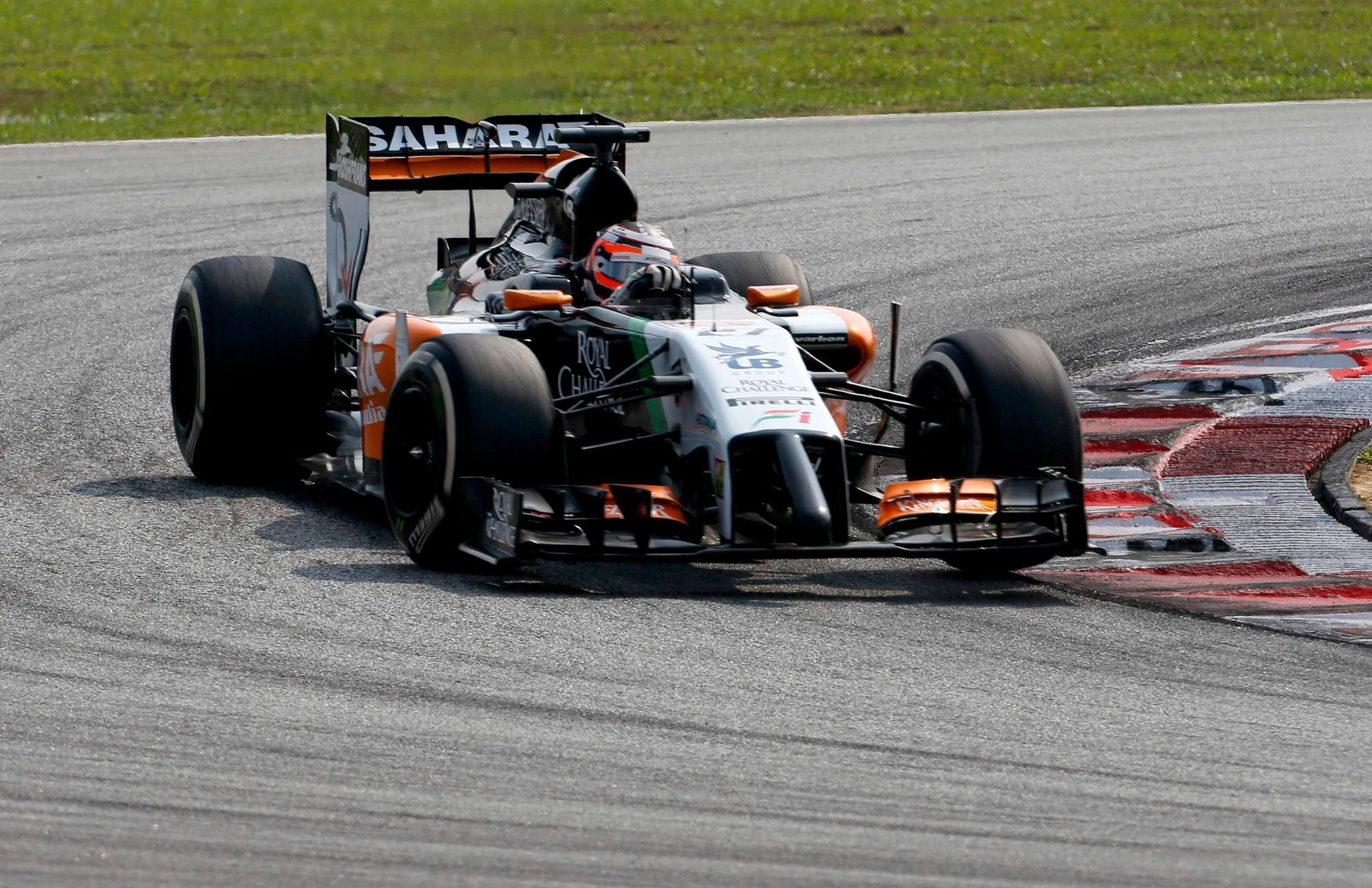 Force India Formula One driver Hulkenberg of Germany takes a corner during the Malaysian F1 Grand Prix at Sepang International Circuit outside Kuala Lumpur