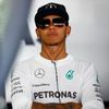 Mercedes Formula One driver Hamilton waits during the first free practice session ahead of the German F1 Grand Prix at the Hockenheim racing circuit