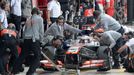 McLaren Formula One driver Jenson Button of Britain makes a pit stop during qualifying the British Grand Prix at the Silverstone Race circuit, central England, June 29, 2