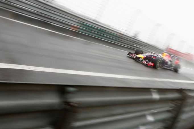 Red Bull Racing Formula One driver Sebastian Vettel of Germany drives during the qualifying session for the Chinese F1 Grand Prix at the Shanghai International circuit, A