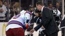 Jun 4, 2014; Los Angeles, CA, USA; Los Angeles Kings former player Wayne Gretzky drops the ceremonial puck with right wing Dustin Brown (23) and New York Rangers center B