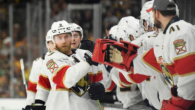 May 12, 2024; Boston, Massachusetts, USA; Florida Panthers center Sam Bennett (9) is congratulated by his teammates after scoring a goal during the third period in game f