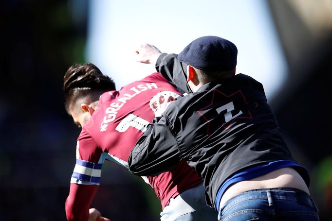 Soccer Football - Championship - Birmingham City v Aston Villa - St Andrew's, Birmingham, Britain - March 10, 2019   A fan invades the pitch and attacks Aston Villa's Jac