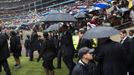 U.S. President Barack Obama enters the First National Bank Stadium during the mass memorial service for late South African President Nelson Mandela in Johannesburg December 10, 2013.